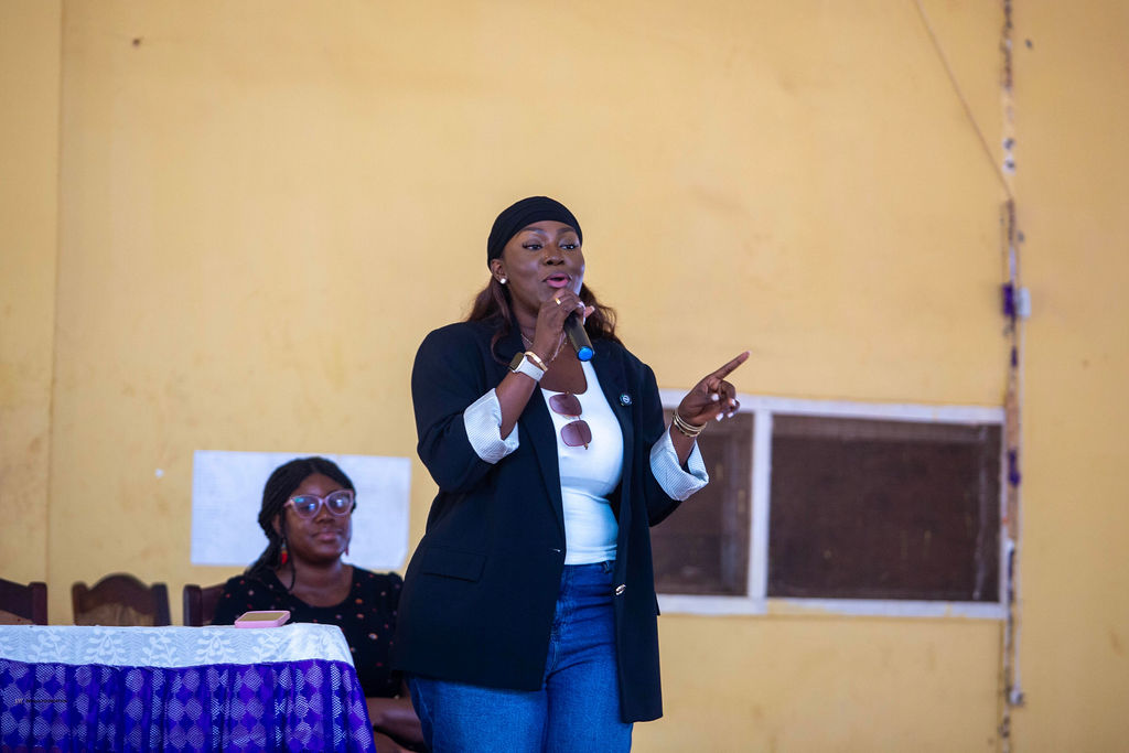 Community members attending a free health outreach in Ghana